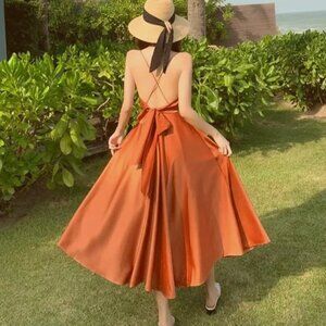 NWOT Backless Satin Maxi Dress with Plunge Neckline and Tie-Back Bow